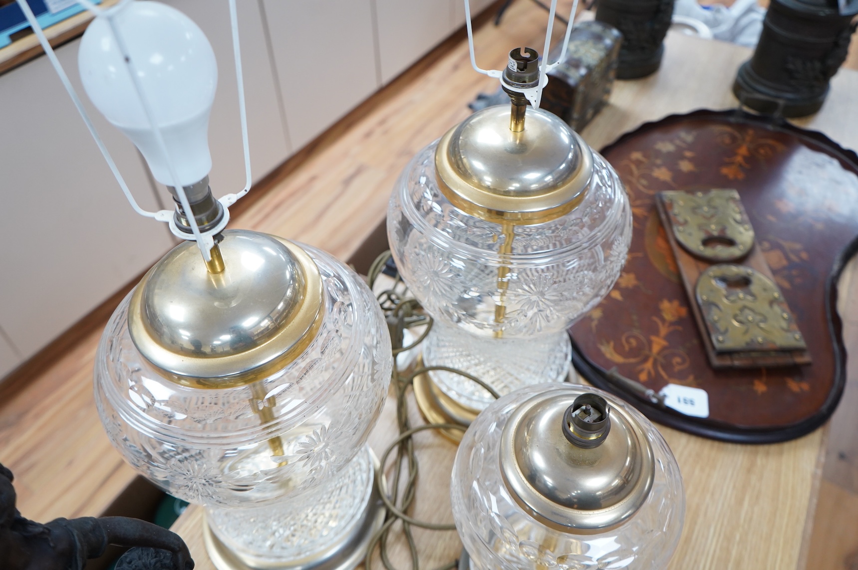 A pair of Waterford glass table lamps, 40 cm high and a smaller similar lamp